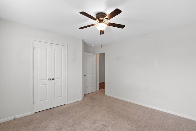 2118 Cone Flower Dr, Forney, TX 75126 - unfurnished bedroom featuring carpet floors, a closet, baseboards, and ceiling fan