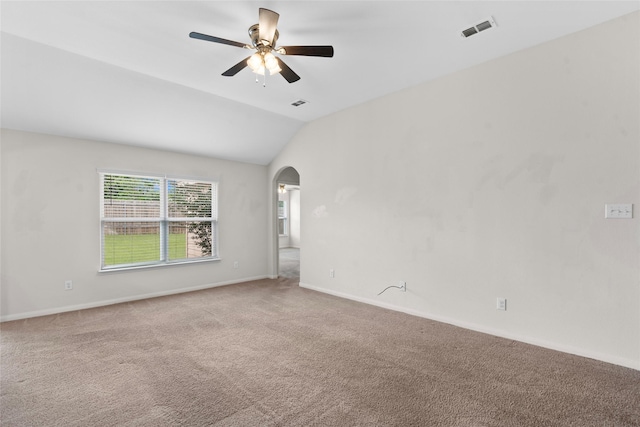 2118 Cone Flower Dr, Forney, TX 75126 - spare room with carpet floors, arched walkways, a ceiling fan, baseboards, and lofted ceiling