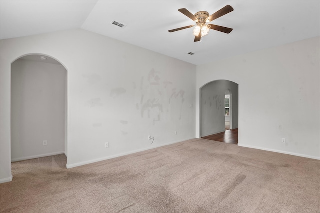 2118 Cone Flower Dr, Forney, TX 75126 - carpeted spare room featuring arched walkways, a ceiling fan, vaulted ceiling, and baseboards