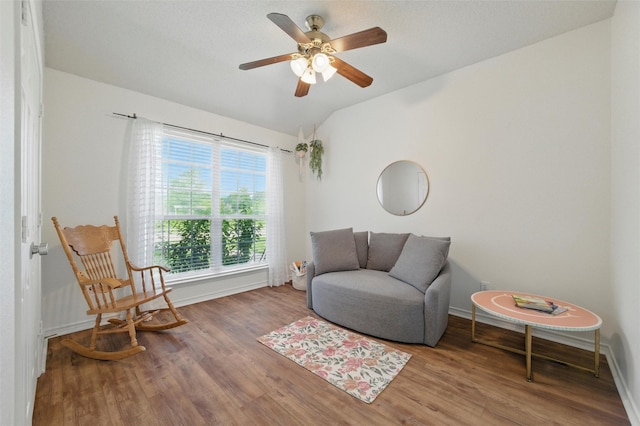 1600 Country Walk Ln, Wylie, TX 75098 - living area with lofted ceiling, wood finished floors, baseboards, and a ceiling fan
