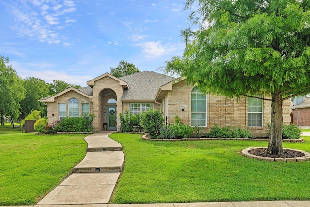 1600 Country Walk Ln, Wylie, TX 75098 - view of front of property with a front yard and brick siding
