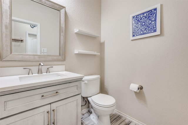 816 Hartsfield St, Aubrey, TX 76227 - bathroom featuring toilet, vanity, and baseboards