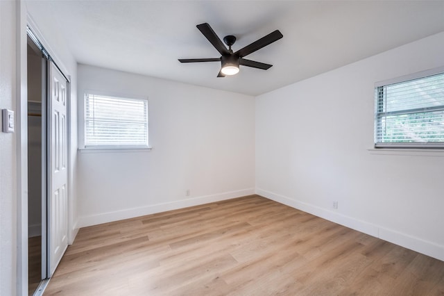 611 Cannon Dr, Euless, TX 76040 - unfurnished bedroom featuring light wood-style floors, baseboards, a closet, and ceiling fan