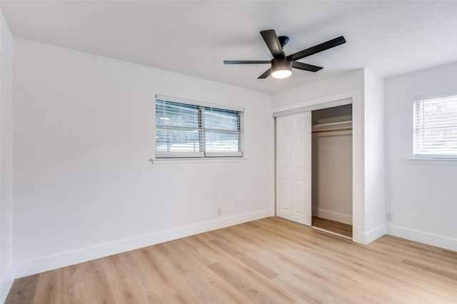 611 Cannon Dr, Euless, TX 76040 - unfurnished bedroom with light wood-style floors, a closet, baseboards, and ceiling fan