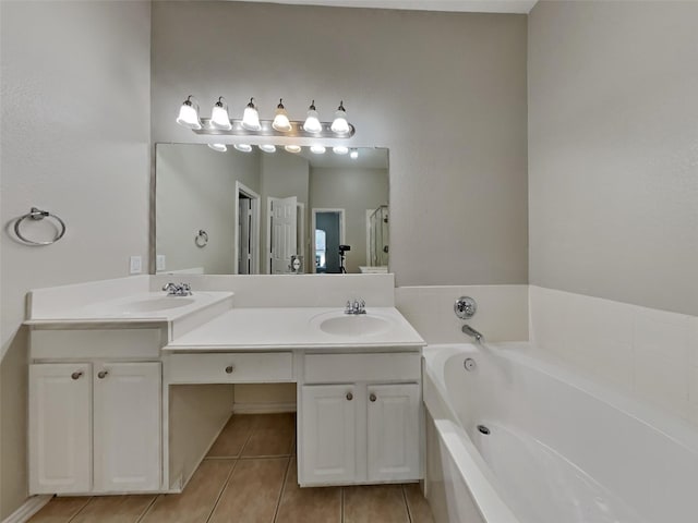 529 Covey Trl, Rockwall, TX 75087 - bathroom featuring tile patterned floors, a bath, and double vanity