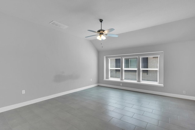 2111 Devonblue Dr, Forney, TX 75126 - spare room with a ceiling fan, vaulted ceiling, and baseboards