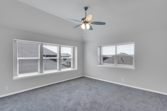 2111 Devonblue Dr, Forney, TX 75126 - carpeted empty room featuring a ceiling fan, healthy amount of natural light, baseboards, and vaulted ceiling