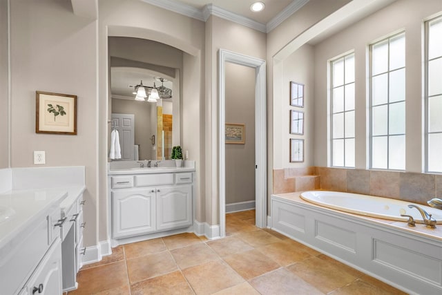 1632 Coyote Rdg, Carrollton, TX 75010 - bathroom with ornamental molding, two vanities, a bath, and baseboards