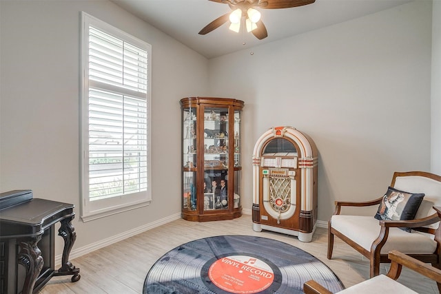 812 Porcupine Dr, Springtown, TX 76082 - living area featuring healthy amount of natural light, ceiling fan, light wood-type flooring, and baseboards