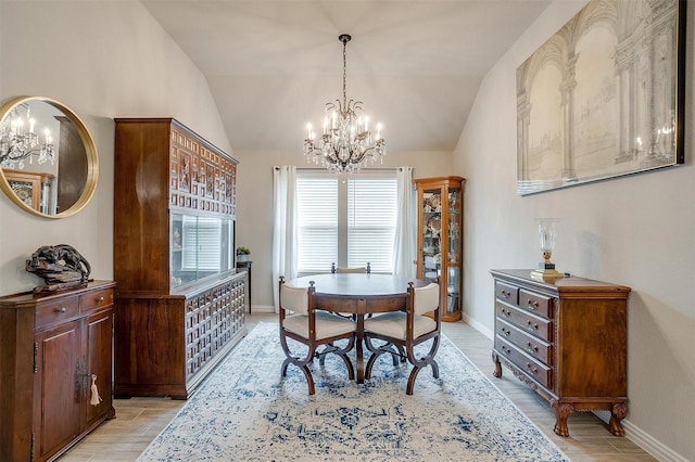 812 Porcupine Dr, Springtown, TX 76082 - dining room featuring a chandelier, vaulted ceiling, light wood finished floors, and baseboards