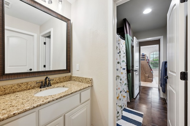 912 Berkshire Rd, Southlake, TX 76092 - full bath featuring vanity, tile patterned floors, a shower with curtain, and recessed lighting