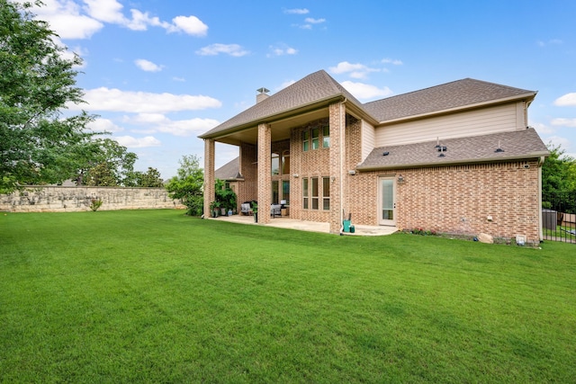 912 Berkshire Rd, Southlake, TX 76092 - back of house with a patio, brick siding, a chimney, and a shingled roof