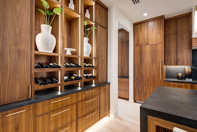 912 Berkshire Rd, Southlake, TX 76092 - wine area featuring light wood-style flooring and recessed lighting