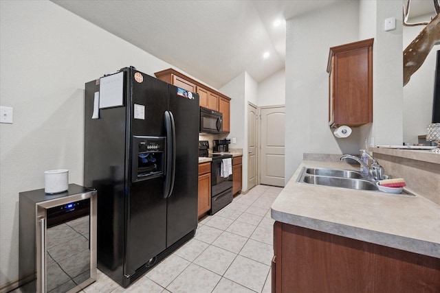 10149 High Eagle Trl, Fort Worth, TX 76108 - kitchen with black appliances, wine cooler, a sink, lofted ceiling, and brown cabinets