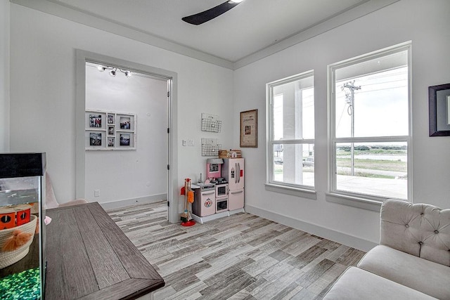 7336 Saint Augustine Dr, Cleburne, TX 76033 - game room with light wood-type flooring, baseboards, and ceiling fan