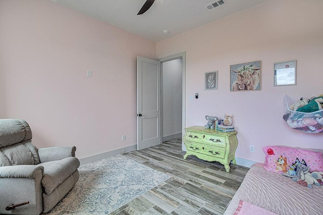 7336 Saint Augustine Dr, Cleburne, TX 76033 - sitting room featuring a ceiling fan, wood finished floors, and baseboards