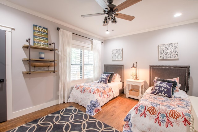 6575 Standing Rock, Malakoff, TX 75148 - bedroom with wood finished floors, ornamental molding, baseboards, recessed lighting, and ceiling fan