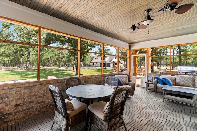 6575 Standing Rock, Malakoff, TX 75148 - sunroom featuring a ceiling fan, outdoor dining area, and plenty of natural light