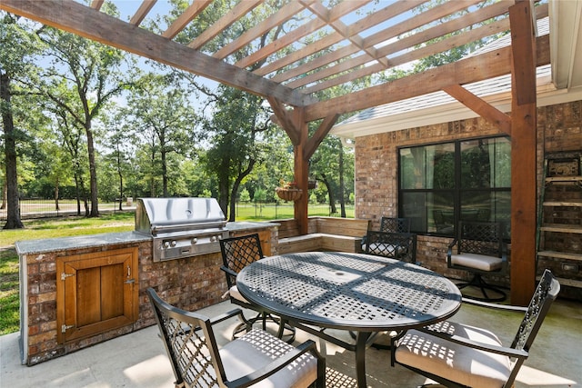 6575 Standing Rock, Malakoff, TX 75148 - view of patio featuring outdoor dining area, a pergola, and view of wooded area