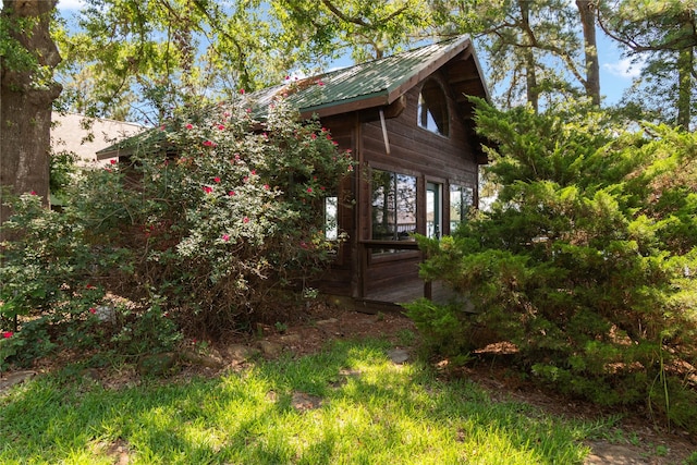 6575 Standing Rock, Malakoff, TX 75148 - view of side of home with metal roof