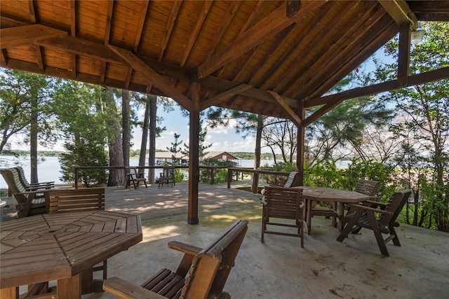 6575 Standing Rock, Malakoff, TX 75148 - view of patio with outdoor dining space and a deck with water view