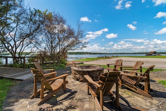 6575 Standing Rock, Malakoff, TX 75148 - view of patio with an outdoor fire pit and a water view