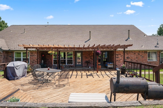10595 Gregory Rd, Sanger, TX 76266 - deck featuring a pergola, a grill, and outdoor dining space
