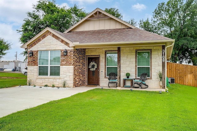 3108 Ridgecrest Dr, Granbury, TX 76048 - view of front of property featuring stone siding, roof with shingles, and board and batten siding
