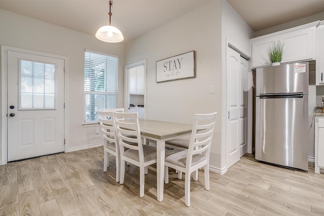 3108 Ridgecrest Dr, Granbury, TX 76048 - dining area featuring light wood-style flooring and baseboards