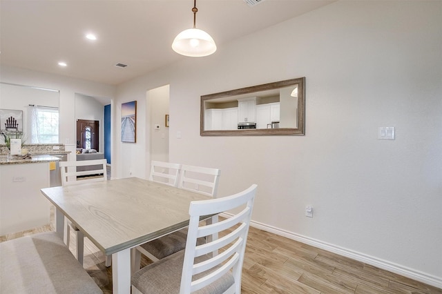 3108 Ridgecrest Dr, Granbury, TX 76048 - dining space with light wood finished floors, baseboards, and recessed lighting