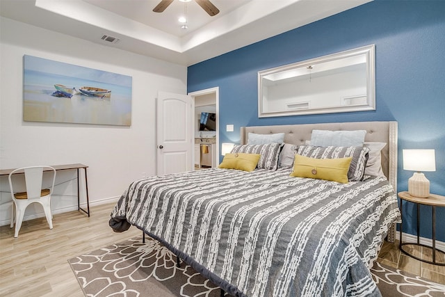 3108 Ridgecrest Dr, Granbury, TX 76048 - bedroom with a raised ceiling, baseboards, and wood finished floors