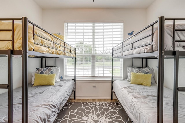 3108 Ridgecrest Dr, Granbury, TX 76048 - bedroom featuring wood finished floors and baseboards