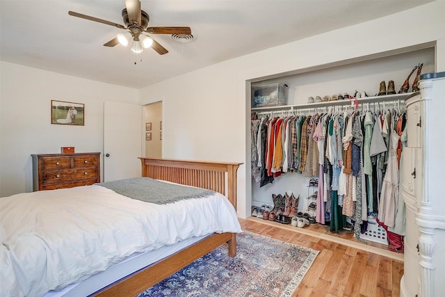 5712 Trail Lake Dr, Fort Worth, TX 76133 - bedroom with a closet, wood finished floors, and a ceiling fan