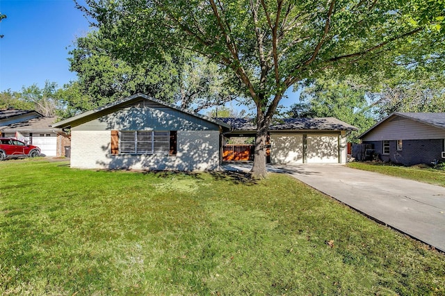 5712 Trail Lake Dr, Fort Worth, TX 76133 - view of front facade with an attached garage, driveway, brick siding, and a front lawn