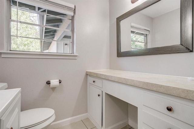 5712 Trail Lake Dr, Fort Worth, TX 76133 - bathroom with vanity, toilet, and baseboards