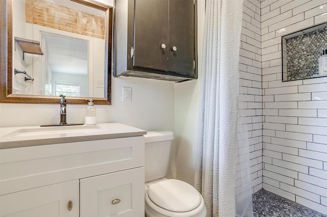 5712 Trail Lake Dr, Fort Worth, TX 76133 - bathroom with toilet, a tile shower, and vanity