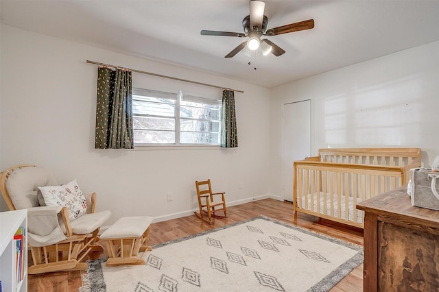 5712 Trail Lake Dr, Fort Worth, TX 76133 - bedroom with wood finished floors, baseboards, and ceiling fan