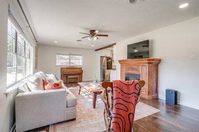 5712 Trail Lake Dr, Fort Worth, TX 76133 - living area featuring a fireplace, wood finished floors, ceiling fan, baseboards, and recessed lighting