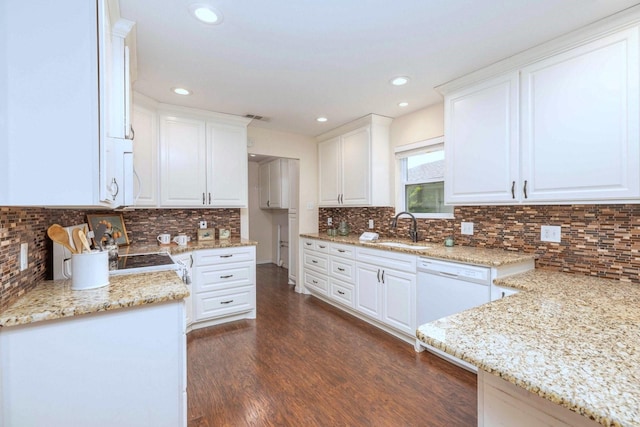 2489 Campus Ct, Abilene, TX 79601 - kitchen with a sink, dishwasher, light stone countertops, white cabinets, and recessed lighting