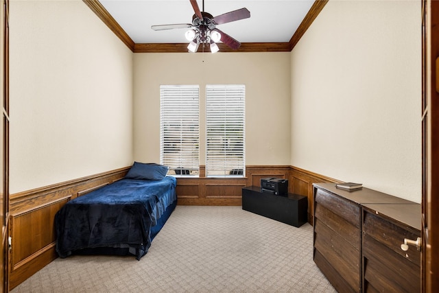 1050 Crystal Falls Dr, Prosper, TX 75078 - bedroom featuring crown molding, wainscoting, light colored carpet, and ceiling fan