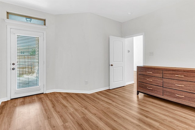 3724 Sicily St, Irving, TX 75038 - unfurnished bedroom with light wood-type flooring, access to outside, and baseboards