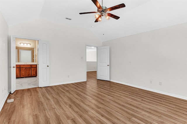 3724 Sicily St, Irving, TX 75038 - unfurnished bedroom with vaulted ceiling, light wood-style floors, ensuite bath, baseboards, and a ceiling fan