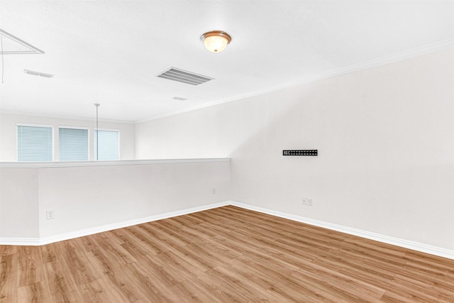 3724 Sicily St, Irving, TX 75038 - empty room featuring ornamental molding, wood finished floors, and baseboards
