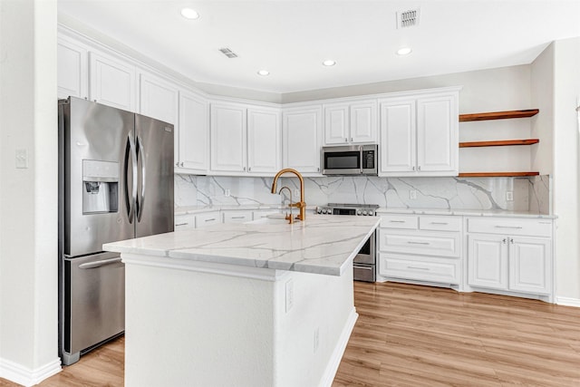 3724 Sicily St, Irving, TX 75038 - kitchen featuring appliances with stainless steel finishes, white cabinets, open shelves, light wood-type flooring, and recessed lighting