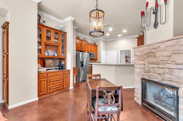 1125 Starling Ct, Burleson, TX 76028 - kitchen featuring appliances with stainless steel finishes, crown molding, brown cabinetry, finished concrete flooring, and baseboards
