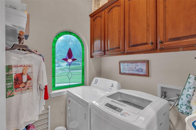 1125 Starling Ct, Burleson, TX 76028 - washroom featuring separate washer and dryer and cabinet space