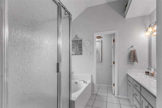 1125 Starling Ct, Burleson, TX 76028 - bathroom featuring a stall shower, double vanity, a garden tub, tile patterned flooring, and baseboards