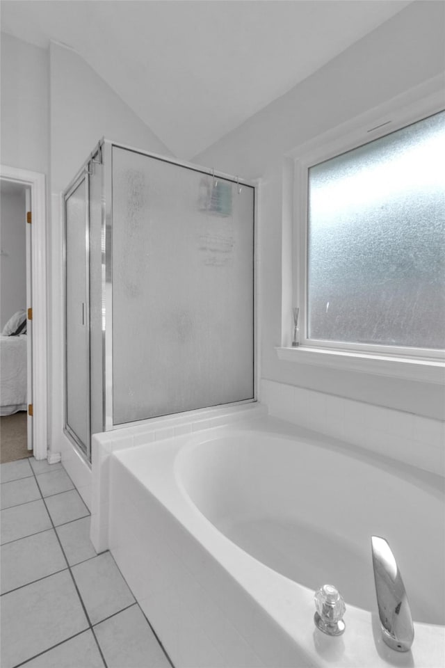 1125 Starling Ct, Burleson, TX 76028 - ensuite bathroom featuring a garden tub, tile patterned flooring, and a shower stall