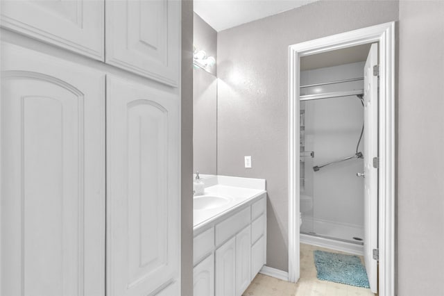 1125 Starling Ct, Burleson, TX 76028 - full bath featuring vanity, baseboards, and a shower