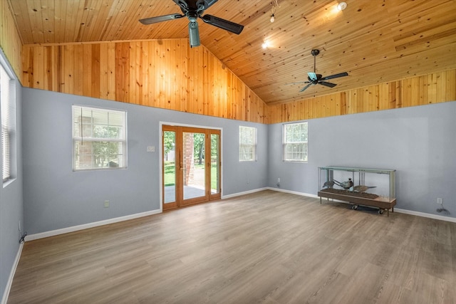 209 Circle Dr, Alvarado, TX 76009 - unfurnished living room featuring ceiling fan, wood ceiling, wood finished floors, high vaulted ceiling, and baseboards